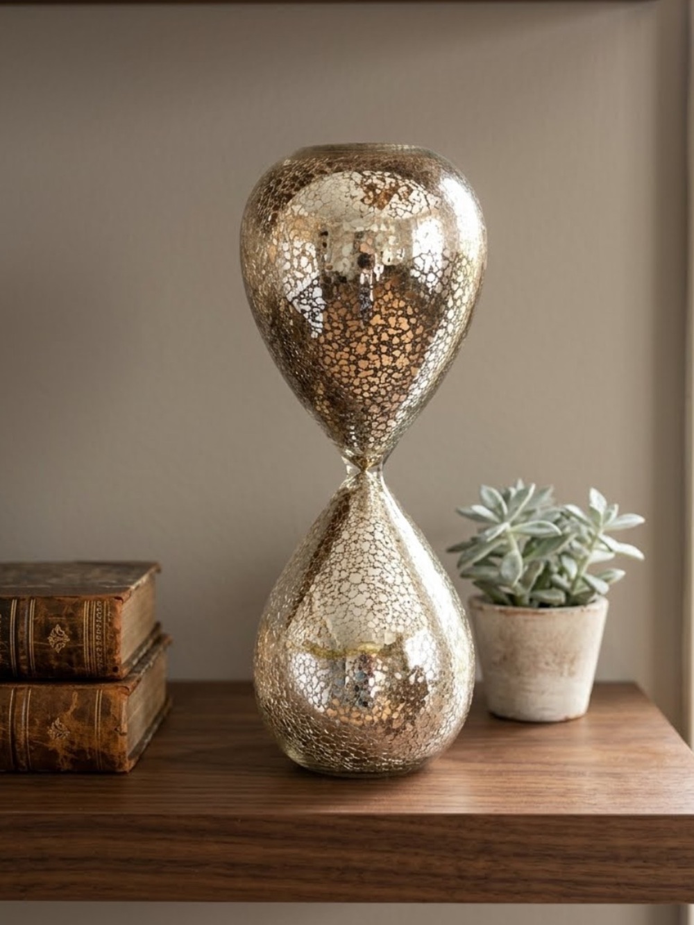 Metallic Mercury Glass Hourglass Sculpture Decor 
Black sand
Unique